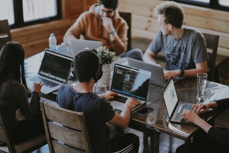 Tech professionals collaborating in a mentorship session at Beyond Boundaries